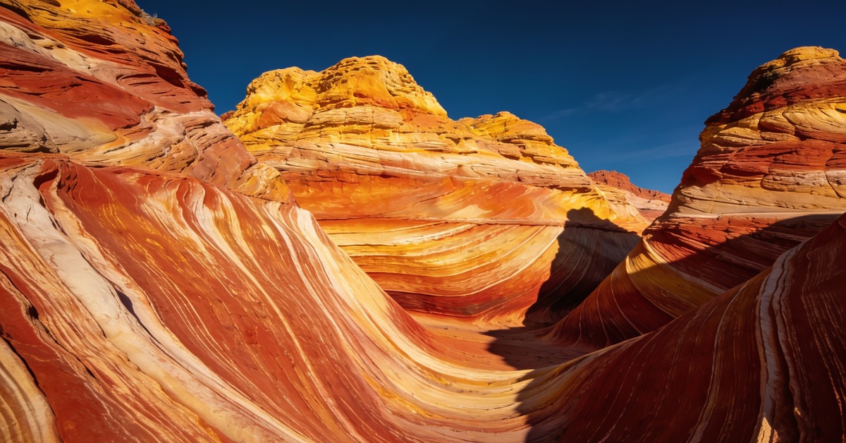 The Wave Arizona: geschwungene rot-orange Sandsteinformation in Coyote Buttes North